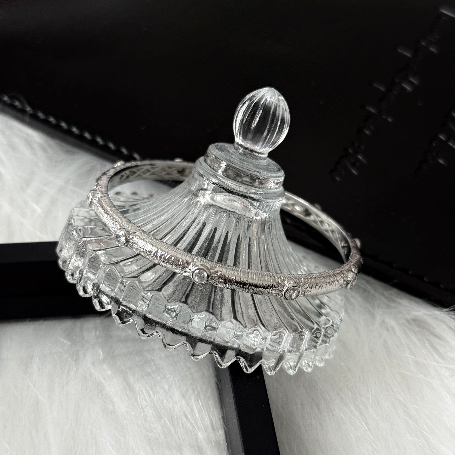 Sterling Silver Rhodium Plated SunStar Zirconia Buccellati Bangle