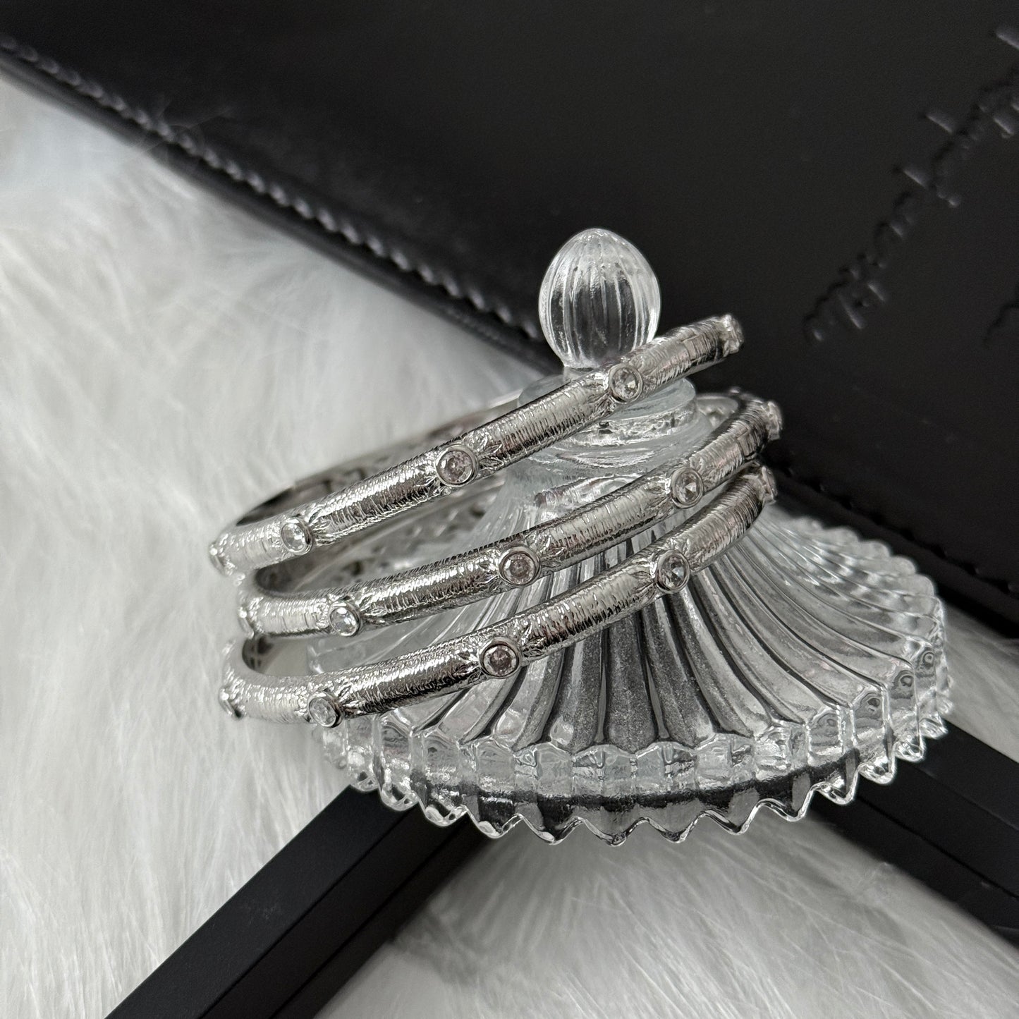 Sterling Silver Rhodium Plated SunStar Zirconia Buccellati Bangle