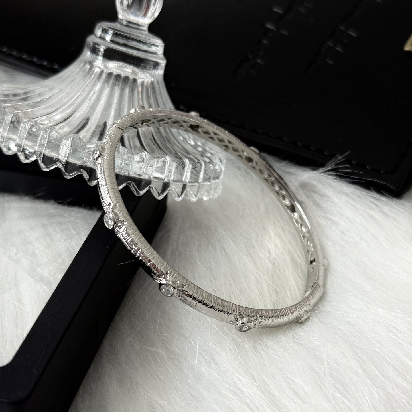 Sterling Silver Rhodium Plated SunStar Zirconia Buccellati Bangle