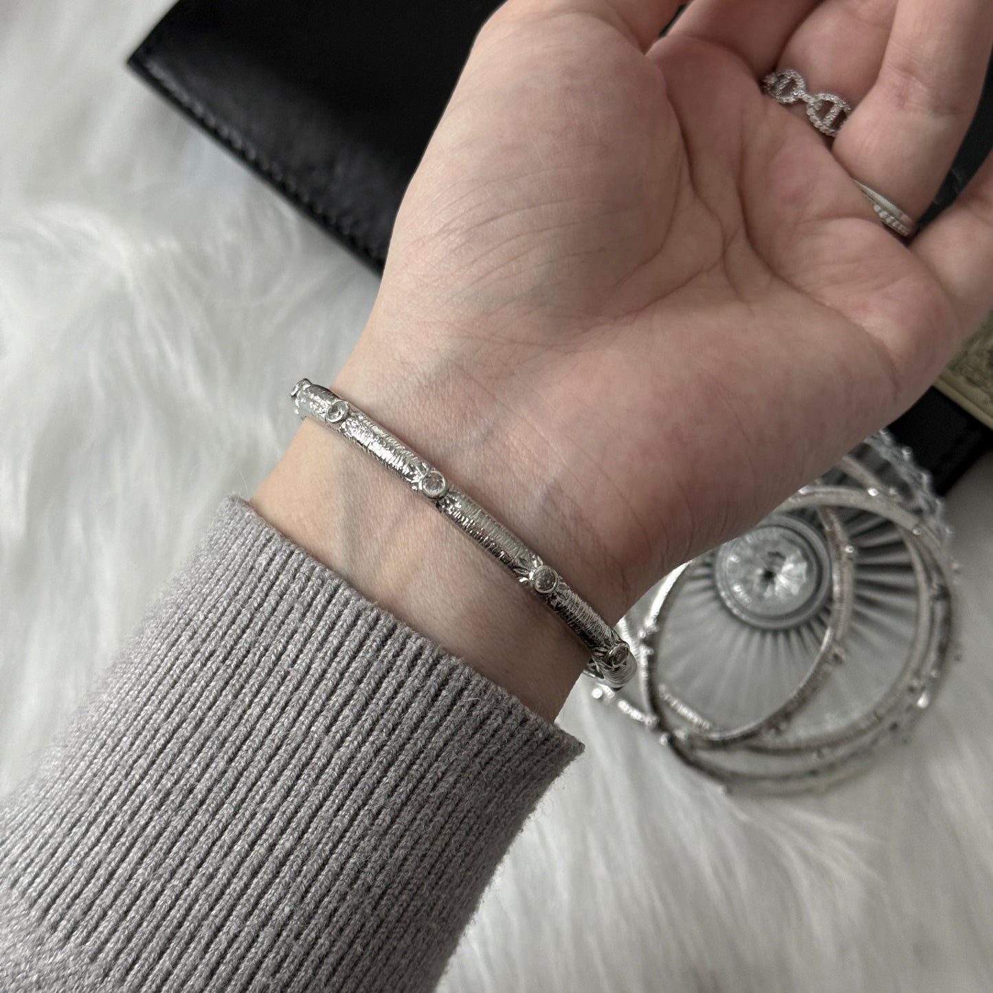 Sterling Silver Rhodium Plated SunStar Zirconia Buccellati Bangle