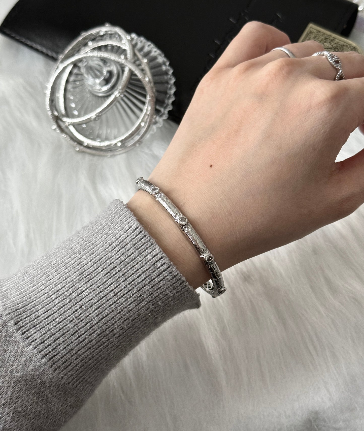 Sterling Silver Rhodium Plated SunStar Zirconia Buccellati Bangle