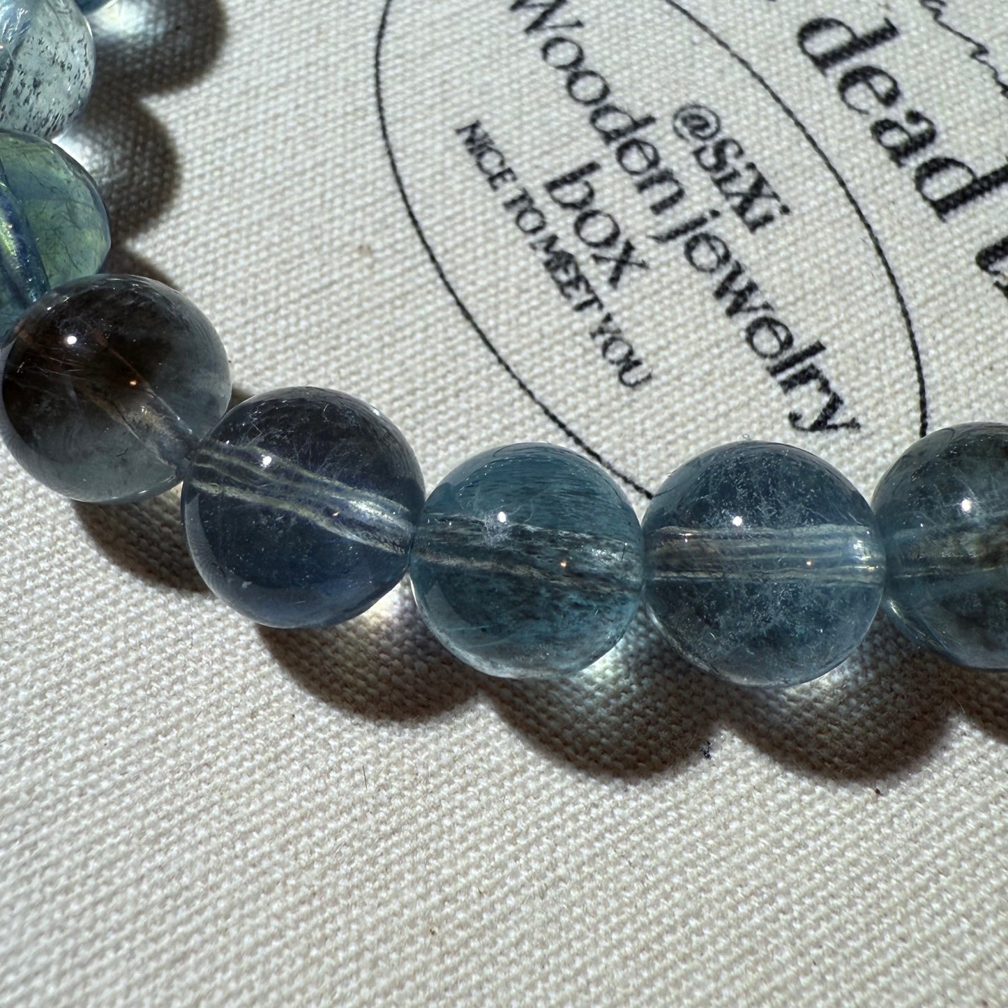 Devil Black & Blue Gold Flashing Aquamarine Bead Bracelet