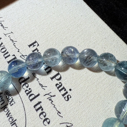 Devil Black & Blue Gold Flashing Aquamarine Bead Bracelet